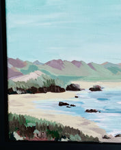 Load image into Gallery viewer, Fine art acrylic painting of the Oregon Coat- Abstract Landscape with blue, green, and dark brown beach scene. The painting is framed in a black canvas floater frame, ready to hang.  This photo shows the details of the brushstrokes in the rocks along the shore of the beach.
